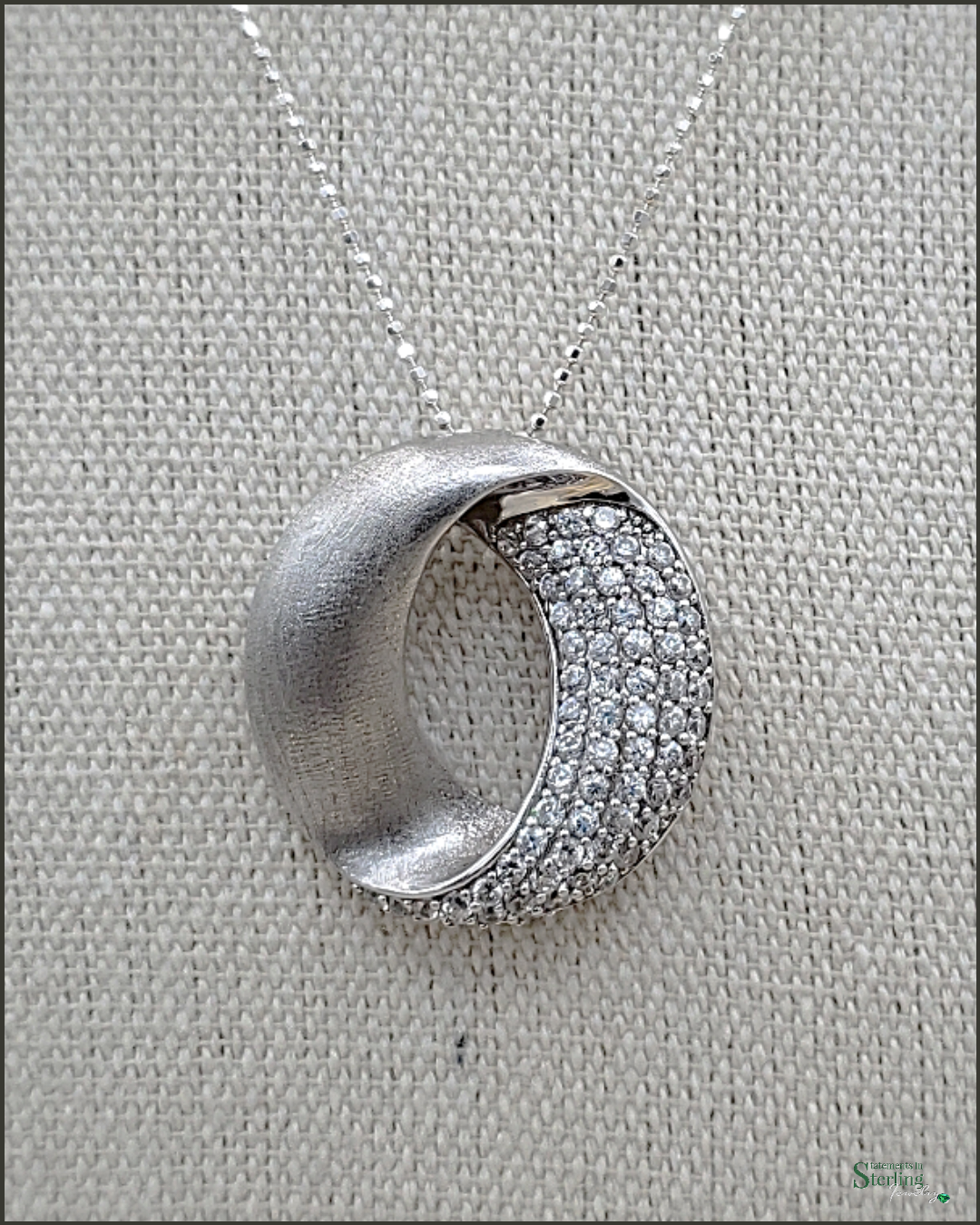 White Topaz and Sterling Silver Pave Circle Pendant