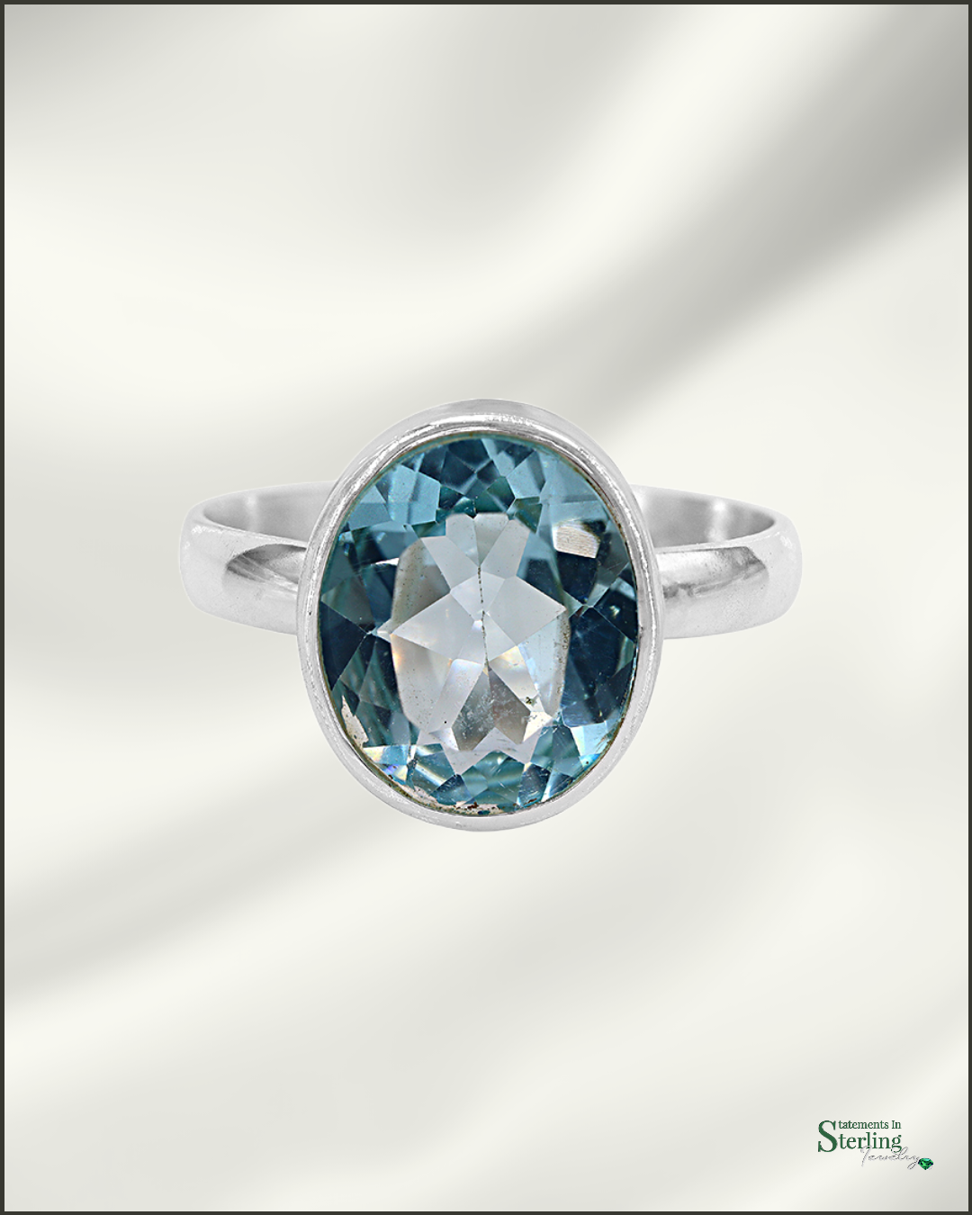 Gemstone and Sterling Silver Oval Ring in Blue Topaz