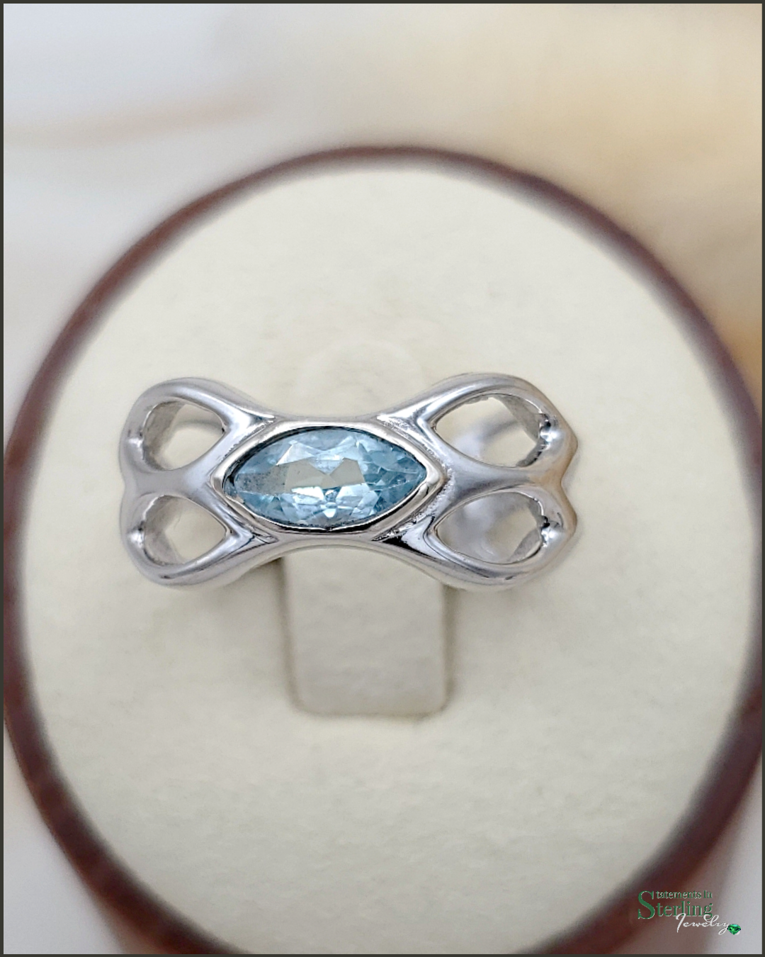 Gemstone and Sterling Silver Leaves Ring in Blue Topaz