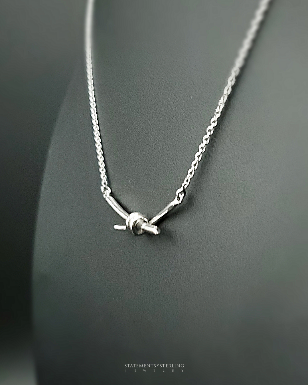 Sterling Silver Love Knot Necklace in Rhodium