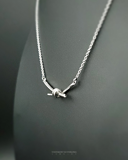 Sterling Silver Love Knot Necklace in Rhodium