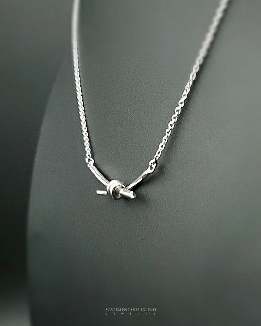 Sterling Silver Love Knot Necklace in Rhodium