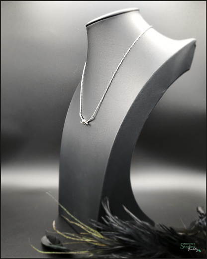 Sterling Silver Love Knot Necklace in Rhodium