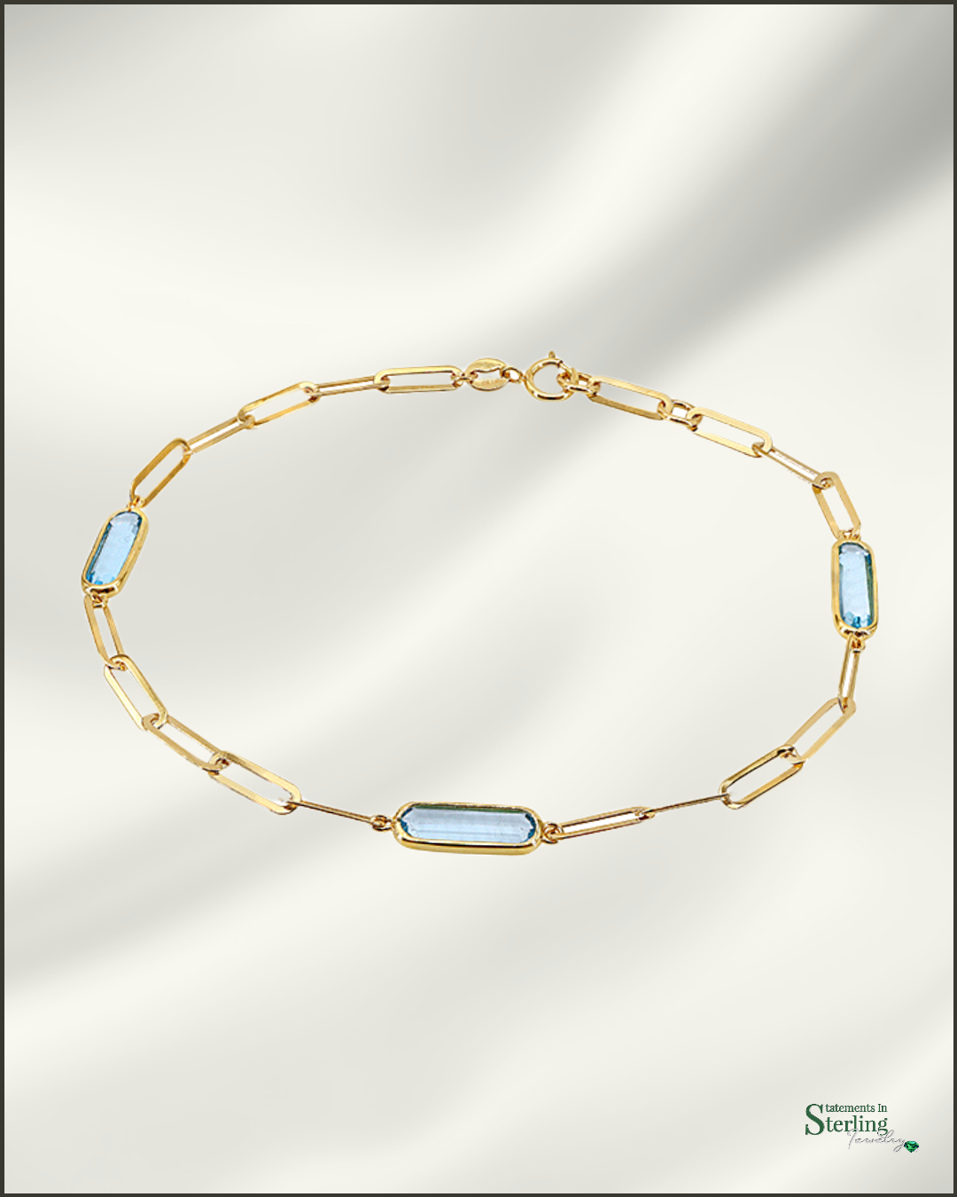 10k Gold Gemstone Station Bracelet in Blue Topaz