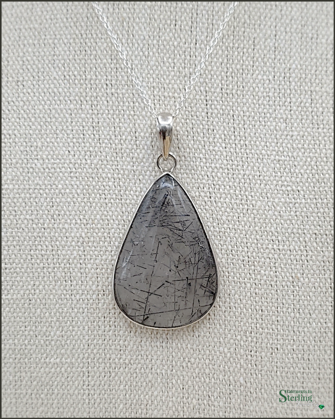 Rutilated Quartz and Sterling Silver Pendant