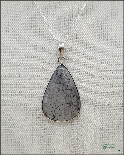 Rutilated Quartz and Sterling Silver Pendant